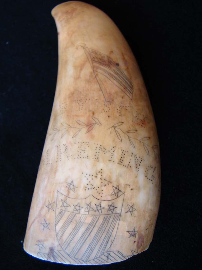A pair of 19th century scrimshawed whales' teeth dating to 1869 — image 3